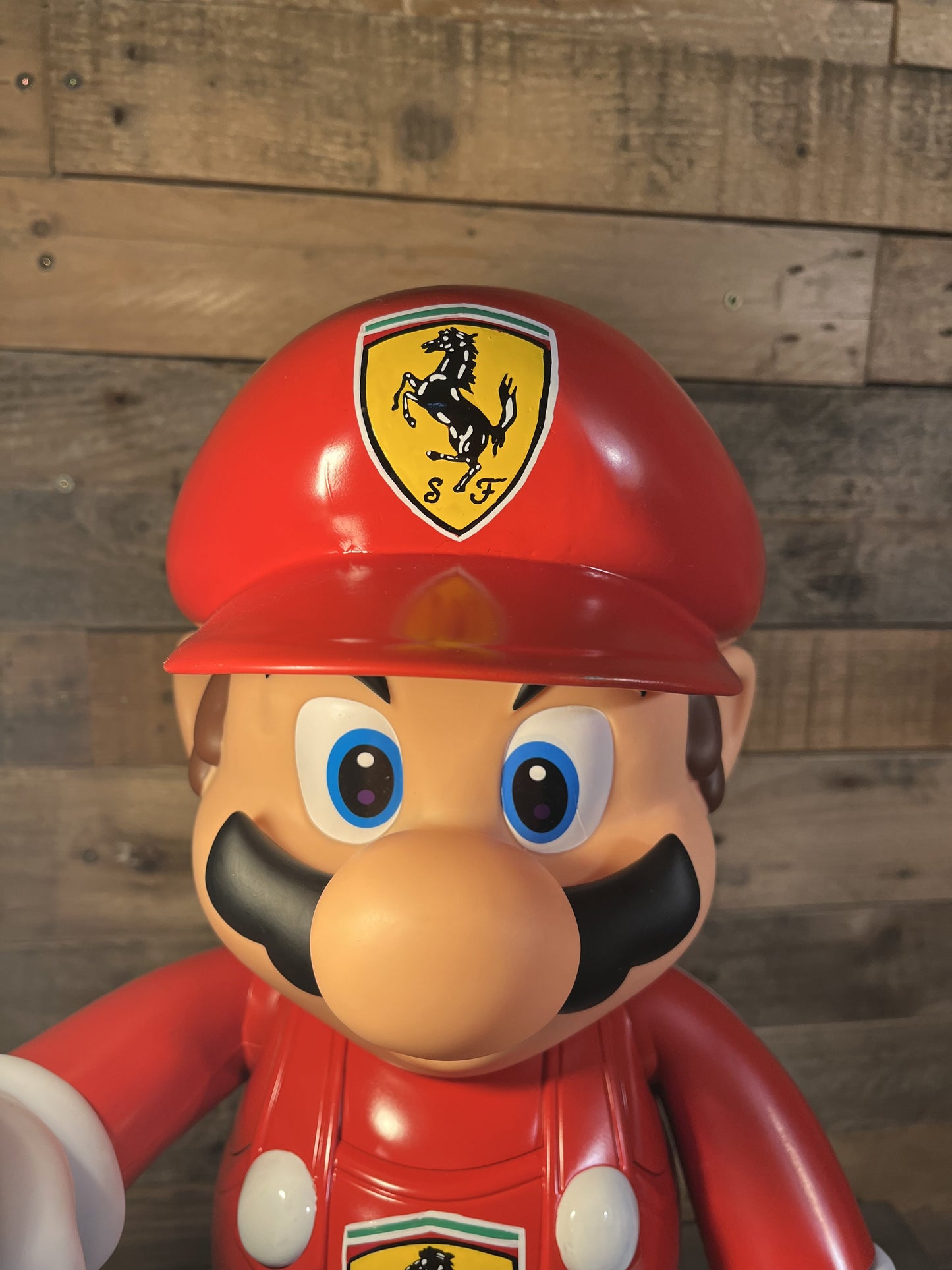 Ferrari red automotive vintage lamp made from a Super Mario miniature, created by Mathieu Ollevier from Vintage Addict, limited edition of 10, 50x30 cm format. Top view showcasing the handpainted detail, a collector’s piece for automotive, vintage and gaming enthusiasts.
