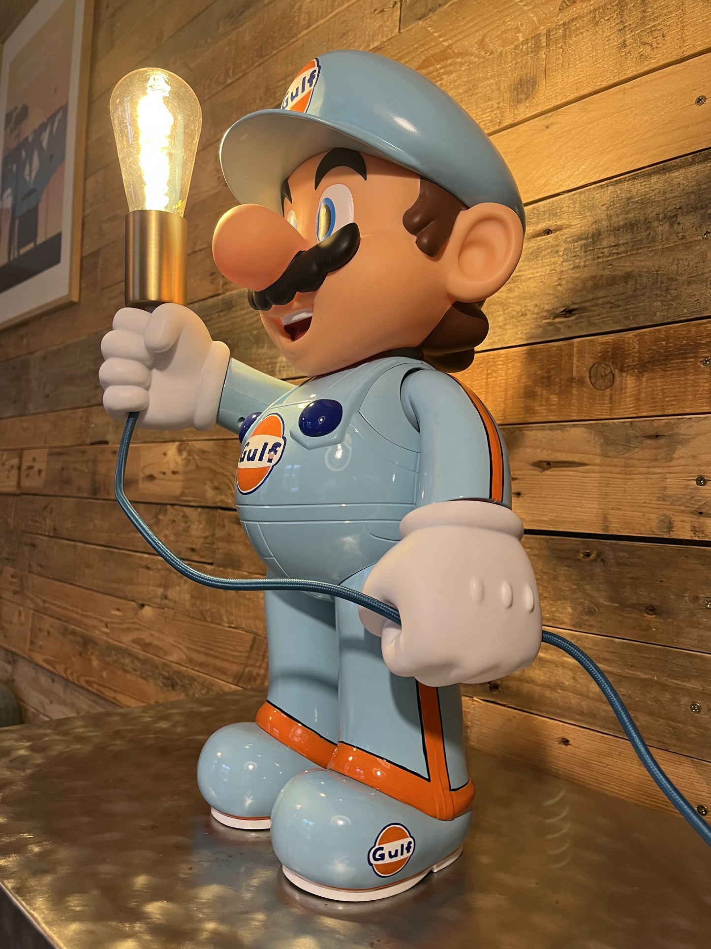 Gulf orange blue automotive vintage lamp made from a Super Mario miniature, created by Mathieu Ollevier from Vintage Addict, limited edition of 10, 50x30 cm format. Side view showcasing the handpainted detail, a collector’s piece for automotive, vintage and gaming enthusiasts.