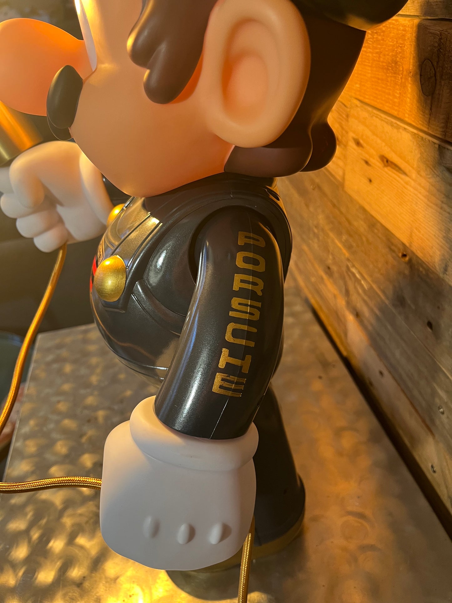 Porsche grey automotive vintage lamp made from a Super Mario miniature, created by Mathieu Ollevier from Vintage Addict, limited edition of 10, 50x30 cm format. Arm view showcasing the handpainted detail, a collector’s piece for automotive, vintage and gaming enthusiasts.