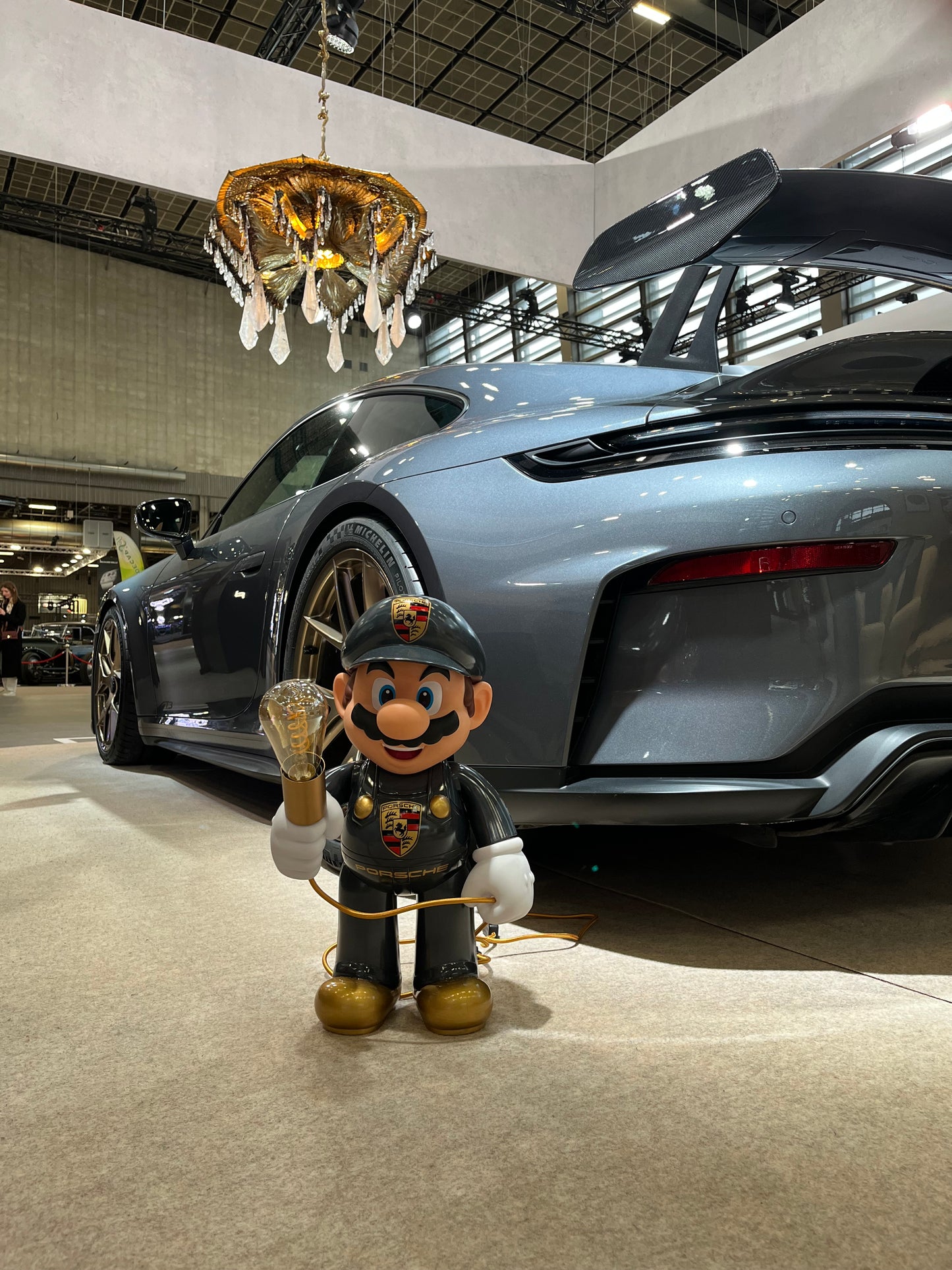 Porsche grey automotive vintage lamp made from a Super Mario miniature, created by Mathieu Ollevier from Vintage Addict, limited edition of 10, 50x30 cm format. Front car view showcasing the handpainted detail, a collector’s piece for automotive, vintage and gaming enthusiasts.
