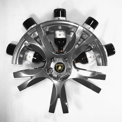 Front view of the car wheel rim bottle display stand made from a Lamborghini Gallardo wheel rim. This automotive art object measures 55x24 cm. Custom-made and handcrafted by Car2Art. Ideal for automotive art collectors. It can hold five bottles of wine or spirits.