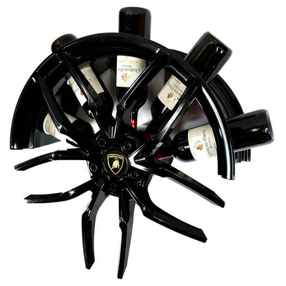 Left-side view of the car wheel rim bottle display stand made from a Lamborghini Huracan wheel rim. This automotive art object measures 55x24 cm. Custom-made and handcrafted by Car2Art. Ideal for automotive art collectors. It can hold five bottles of wine or spirits.