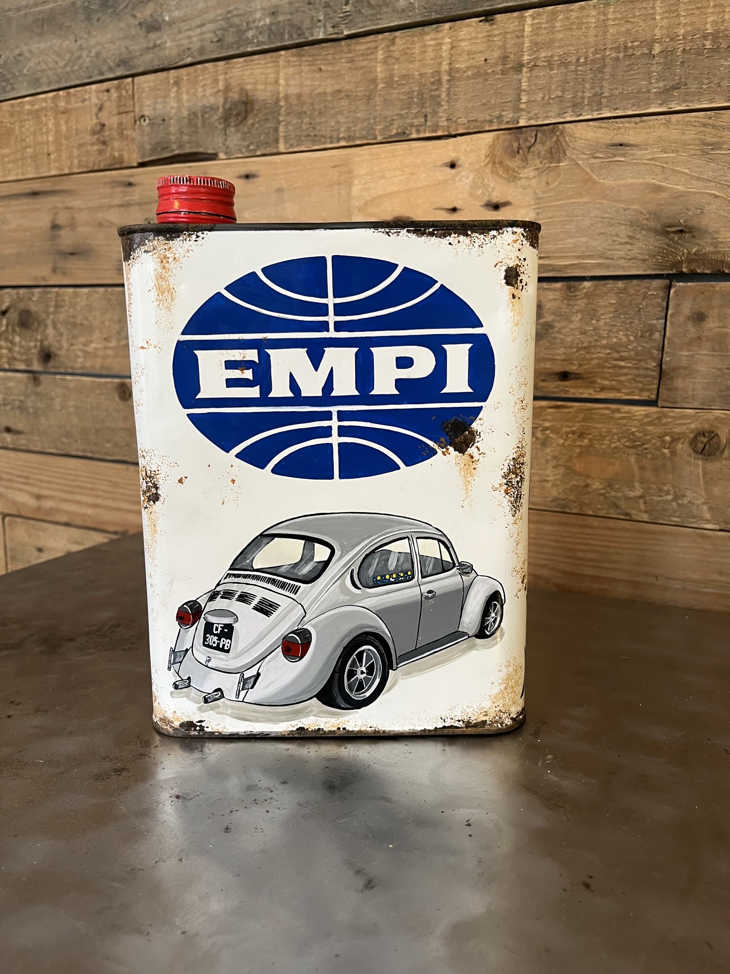 Volkswagen Beetle hand-painted custom vintage automotive vintage automotive oil can, created by Mathieu Ollevier from Vintage Addict, limited edition of 10, 23x17 cm format. Front view showcasing the handpainted detail, a collector’s piece for automotive, vintage and art enthusiasts.