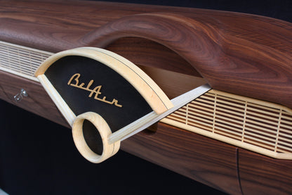 Solid wood furniture representing a Chevrolet Bel Air console, created by Stéphane Carton from Atelier Stéphane Carton, woodworker & cabinetmaker.

Limited edition of 25, 164 x 30 x 30 cm, handcrafted solid American walnut and ash structure, swamp oak veneer (fronts), oiled finish, hand application. Personalization possible.

Perfect for vintage automotive design lovers, classic cars enthusiasts and Chevrolet owners. Hidden drawer view.