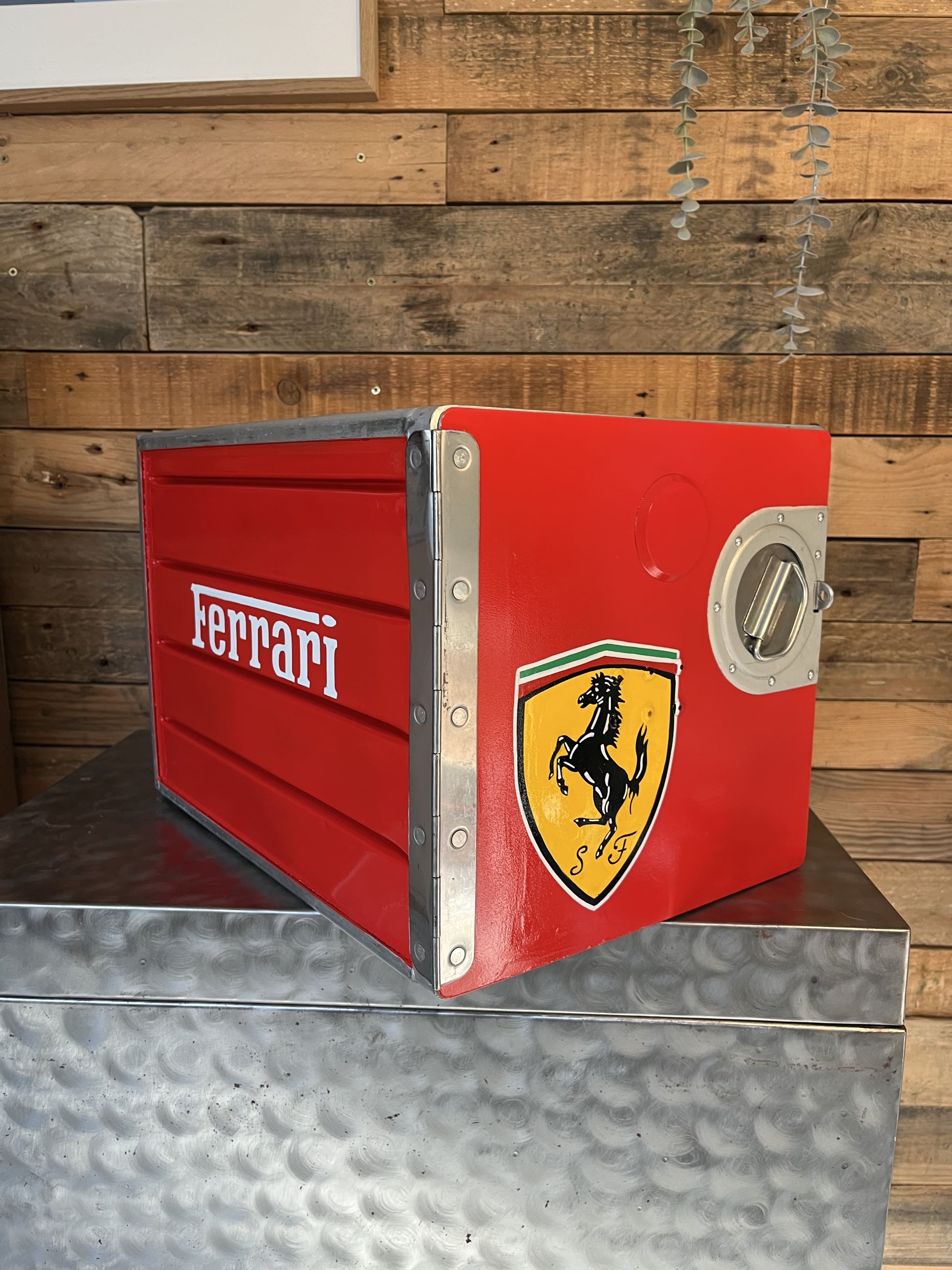 Ferrari red custom automotive galley box, created by Mathieu Ollevier from Vintage Addict, limited edition of 8, 40x28x28 cm format. Front view showcasing the handpainted detail, a collector’s piece for automotive, vintage and aviation enthusiasts.