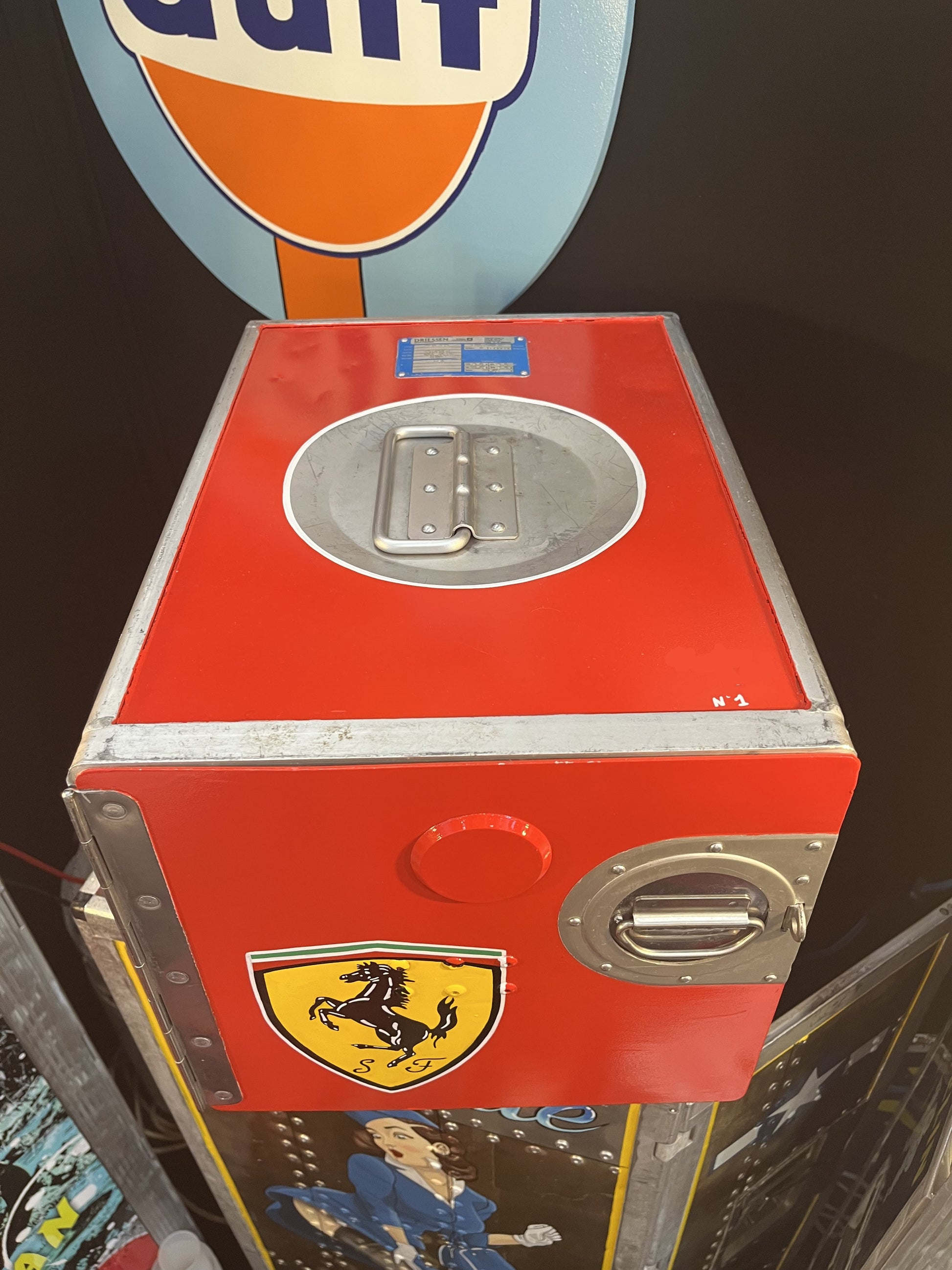 Ferrari red custom automotive galley box, created by Mathieu Ollevier from Vintage Addict, limited edition of 8, 40x28x28 cm format. Top view showcasing the handpainted detail, a collector’s piece for automotive, vintage and aviation enthusiasts.