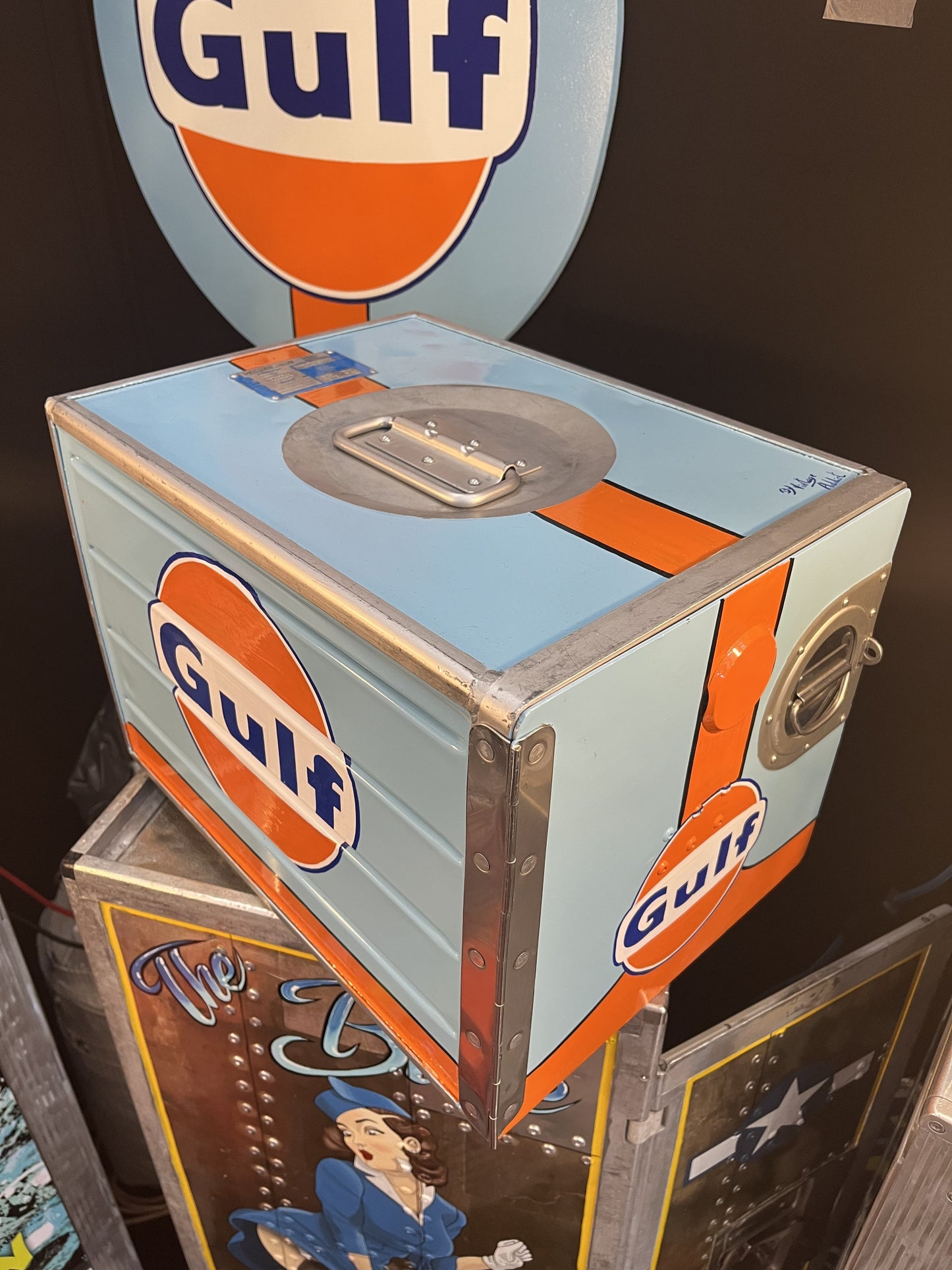 Gulf orange blue hand-painted custom automotive galley box, created by Mathieu Ollevier from Vintage Addict, limited edition of 8, 40x28x28 cm format. Top view showcasing the handpainted detail, a collector’s piece for automotive, vintage and aviation enthusiasts.