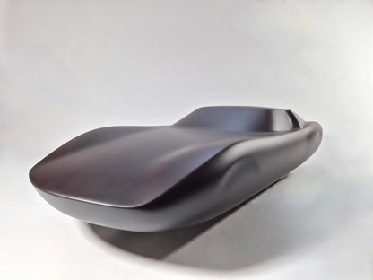 Solid mahogany sculpture with ebony matte finish representing a Lamborghini Miura, created by David Voisin from Maison V&P, limited edition, 30x66 cm. Front left view capturing the iconic front end and dynamic curves of this legendary supercar, a collector’s piece for automotive and fine craftsmanship enthusiasts.