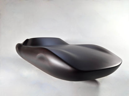 Solid mahogany sculpture with ebony matte finish representing a Lamborghini Miura, created by David Voisin from Maison V&P, limited edition, 30x66 cm. Front right view unveiling the iconic lines and elegant silhouette of this collectible supercar, a work of art for automotive and fine craftsmanship enthusiasts.