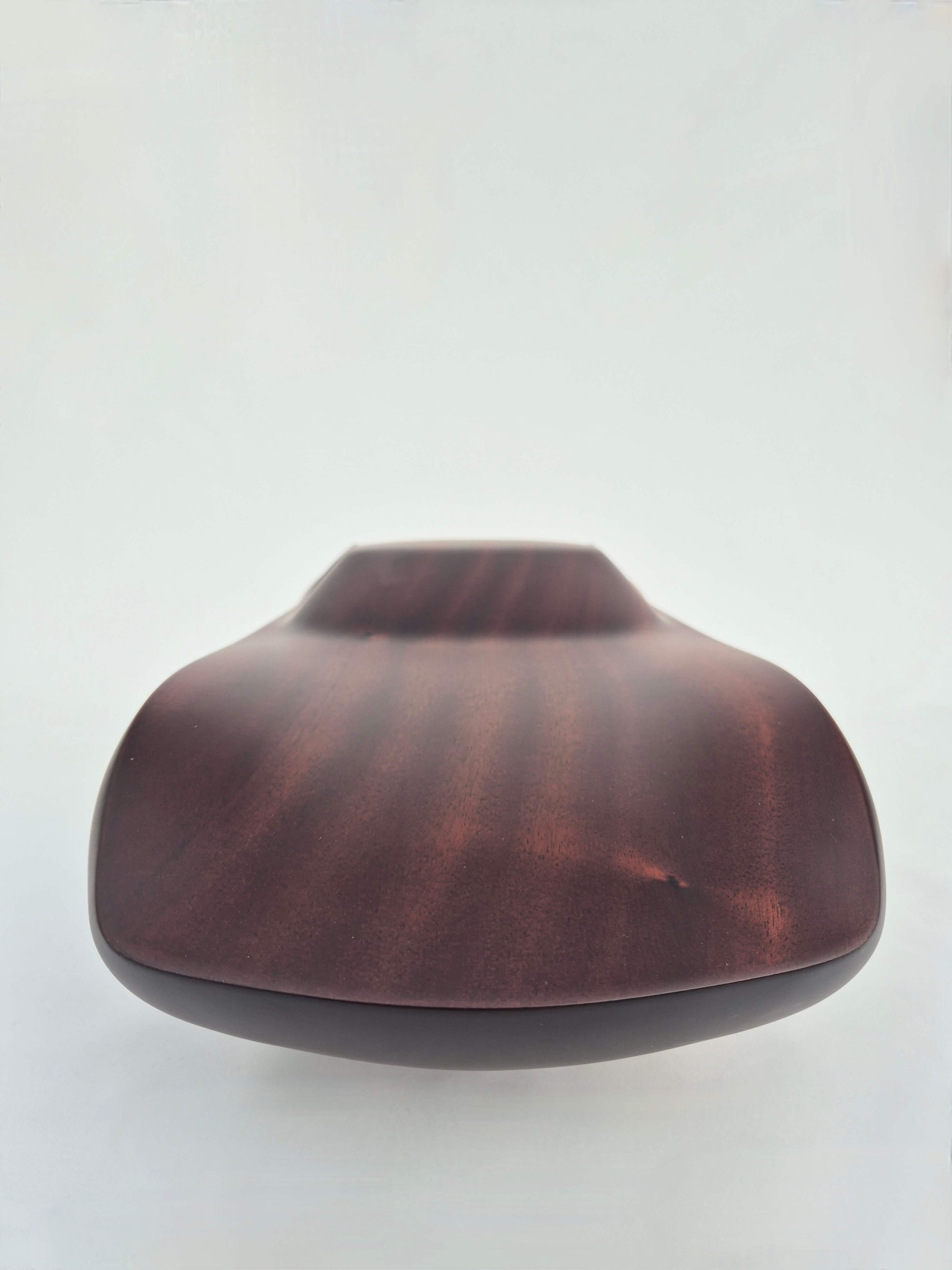 Solid mahogany sculpture with natural matte finish representing a Lamborghini Miura, created by David Voisin from Maison V&P, limited edition, 30x66 cm format. Front view showcasing the iconic lines and harmonious proportions of this legendary supercar, a collector’s piece for automotive and fine craftsmanship enthusiasts.