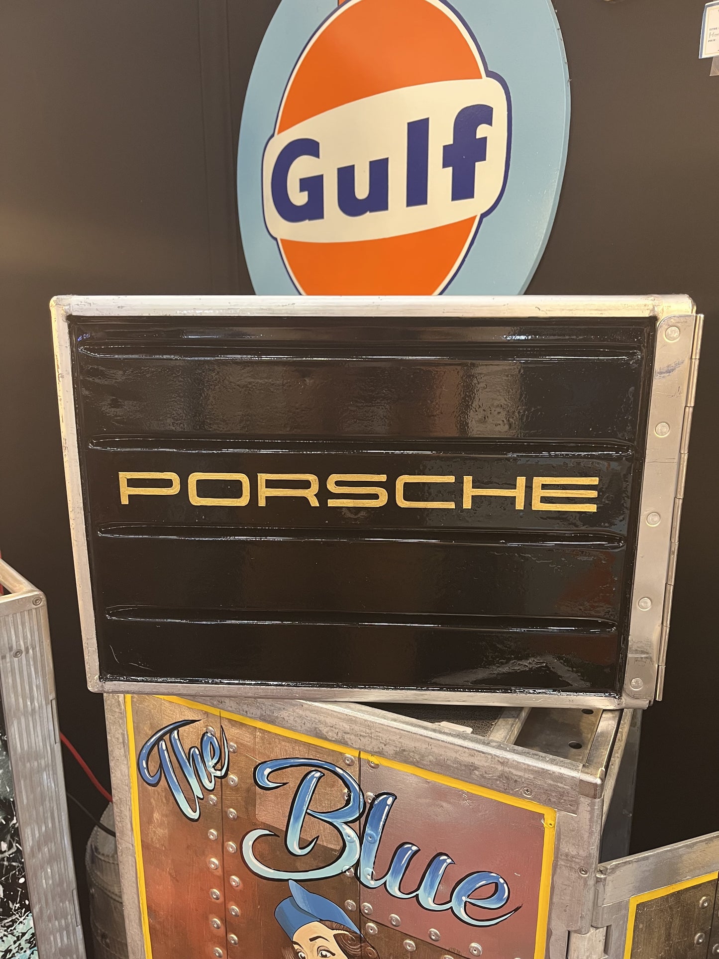 Porsche black custom automotive galley box, created by Mathieu Ollevier from Vintage Addict, limited edition of 8, 40x28x28 cm format. Side view showcasing the handpainted detail, a collector’s piece for automotive, vintage and aviation enthusiasts.