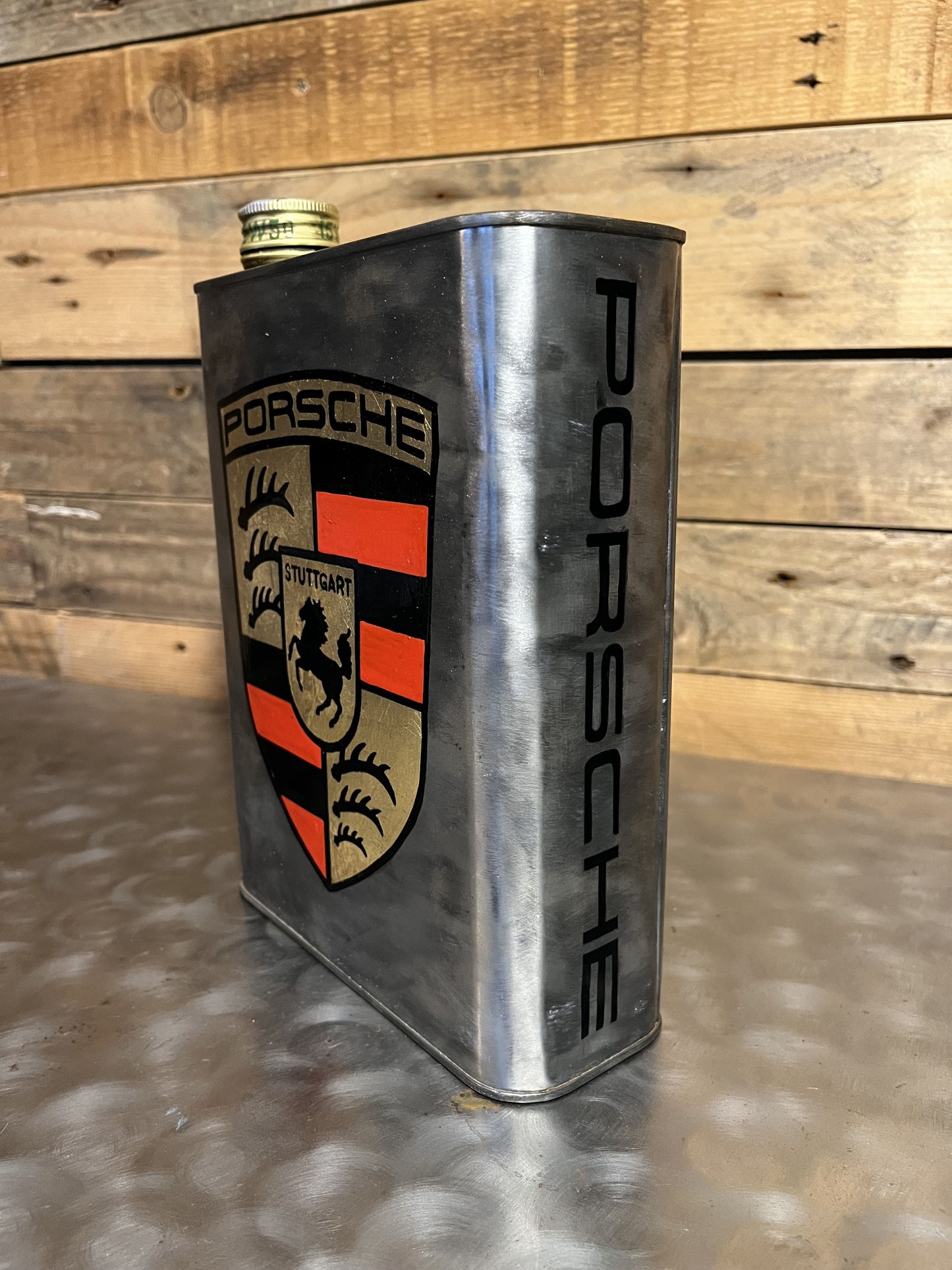 Porsche grey hand-painted custom vintage automotive vintage automotive oil can, created by Mathieu Ollevier from Vintage Addict, limited edition of 10, 23x17 cm format. Left view showcasing the handpainted detail, a collector’s piece for automotive, vintage and art enthusiasts.