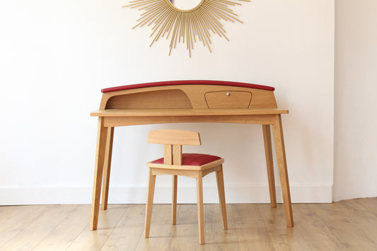 Solid wood furniture representing a Porsche 356 Secretary, created by Stéphane Carton from Atelier Stéphane Carton, woodworker & cabinetmaker.

Limited edition of 25, 130 x 65 x 94 cm, solid oak. Personalization possible.

Perfect for vintage automotive design lovers, classic cars enthusiasts and Porsche 356 owners. Front view.